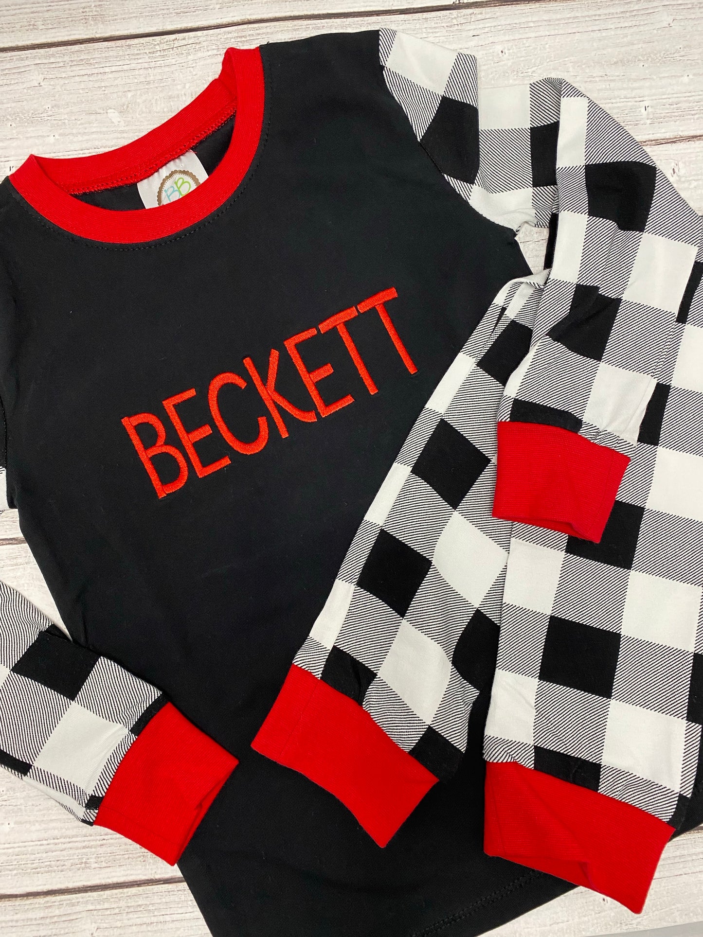 Black Pajama Top with Black/white checkered bottoms